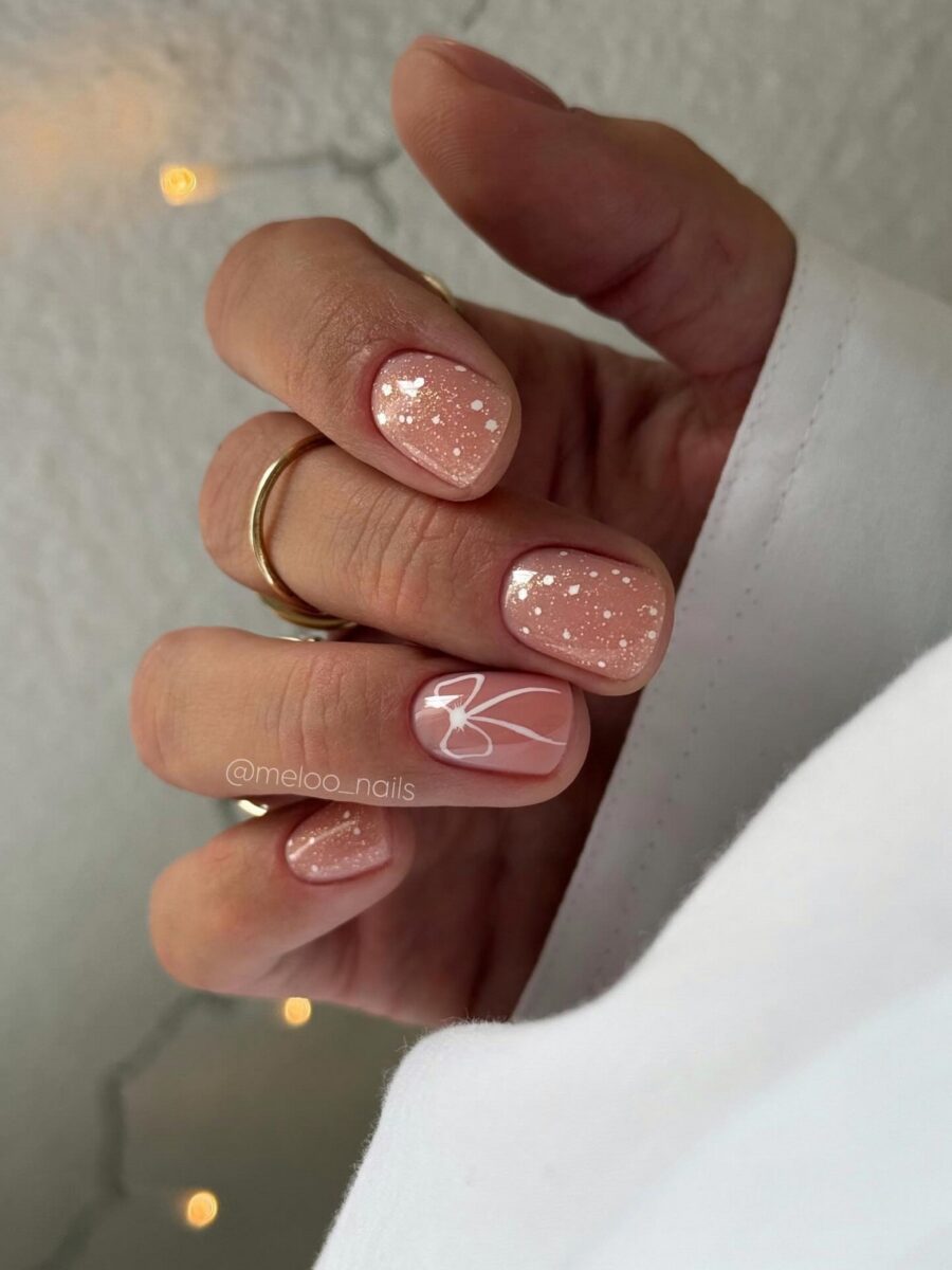 Зимовий манікюр з бантиками: святкові ідеї 2025-2026